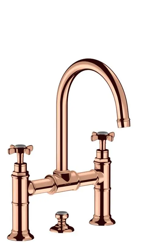 Waschtischarmatur mit zwei Griffen und Kreuzgriffen in Polished Red Gold, produziert von AXOR. Die Armatur hat eine zentrale Einheit und einen herausziehbaren Ablauf.